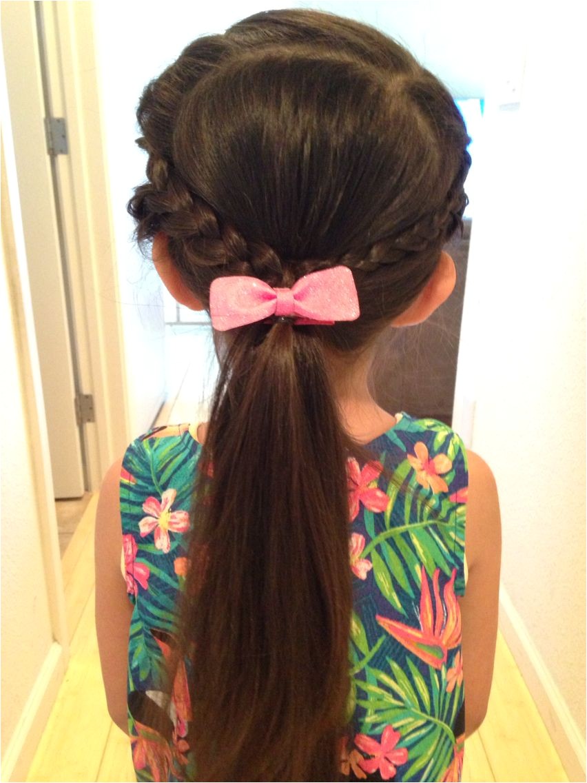 French braided bangs then tied into a low ponytail