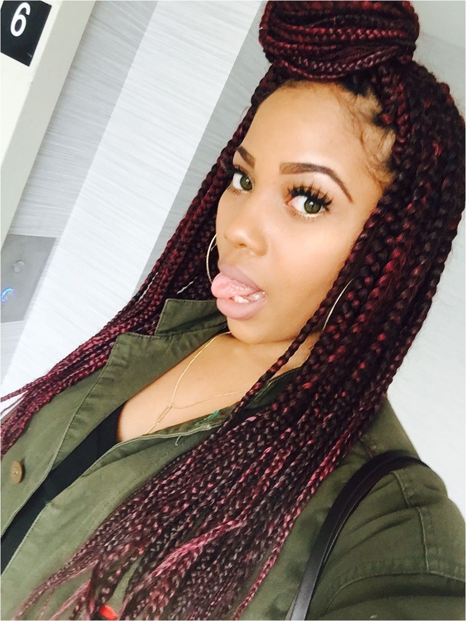 Box braids with red tones mixed