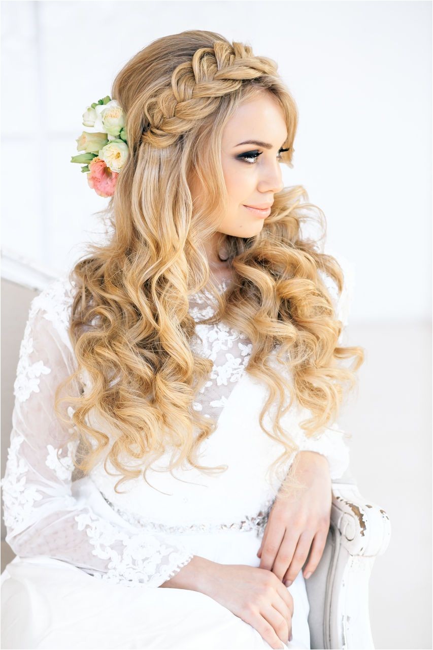 Idike to add one of the hair flowers to the top half and it d be perfect Braids and curls wedding hair inspiration via elstile