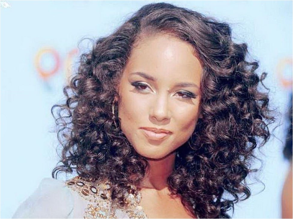 cute african american thick curly hairstyles side bangs for
