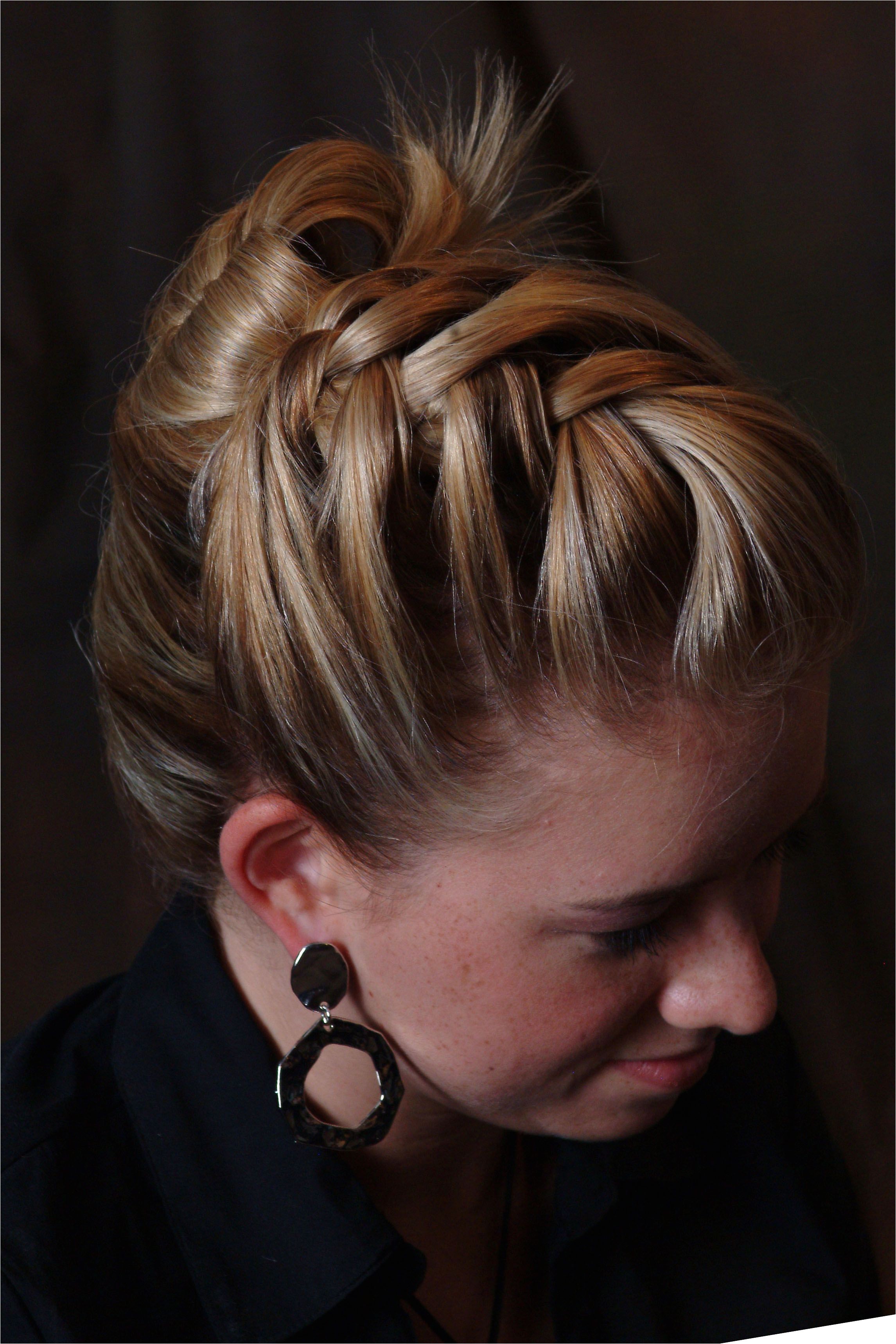 beautiful french braid front with a touch of soft curl and a french twist by Mane Attraction Hair Studio Collinsville Il braids updos