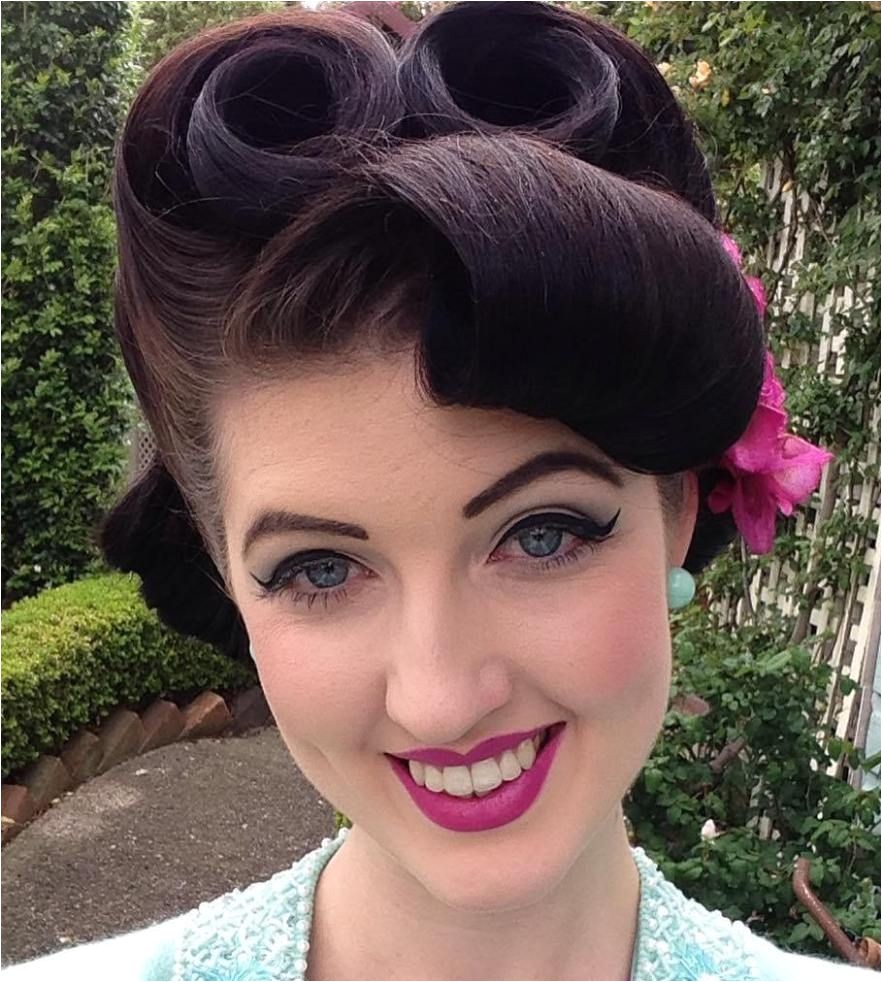 brunette pin up roll updo