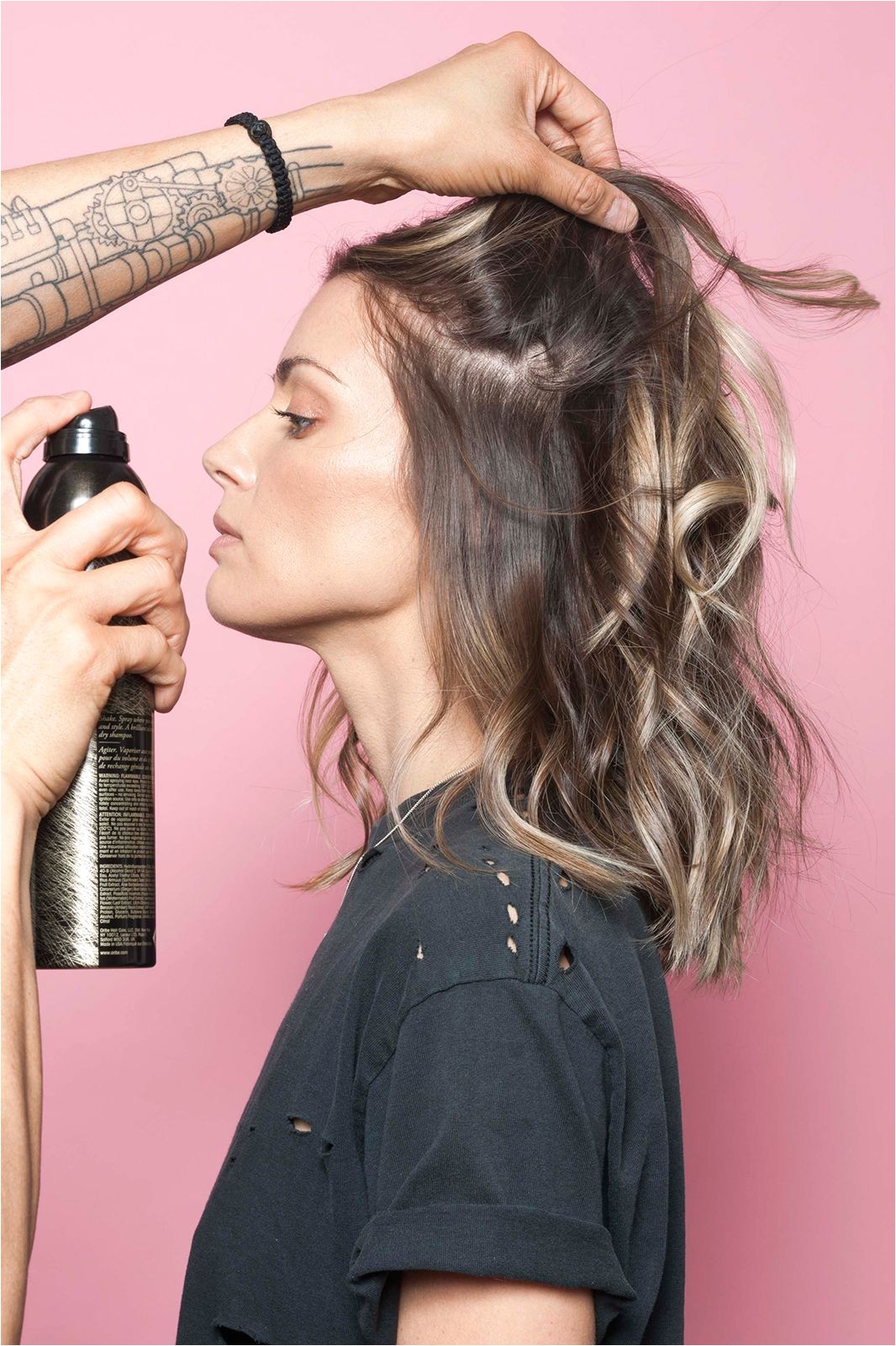 rab a can of texturizing spray or dry shampoo — Tran prefers Oribe s Dry Texture Spray — and blast the roots of your hair holding the spray 12 inches away