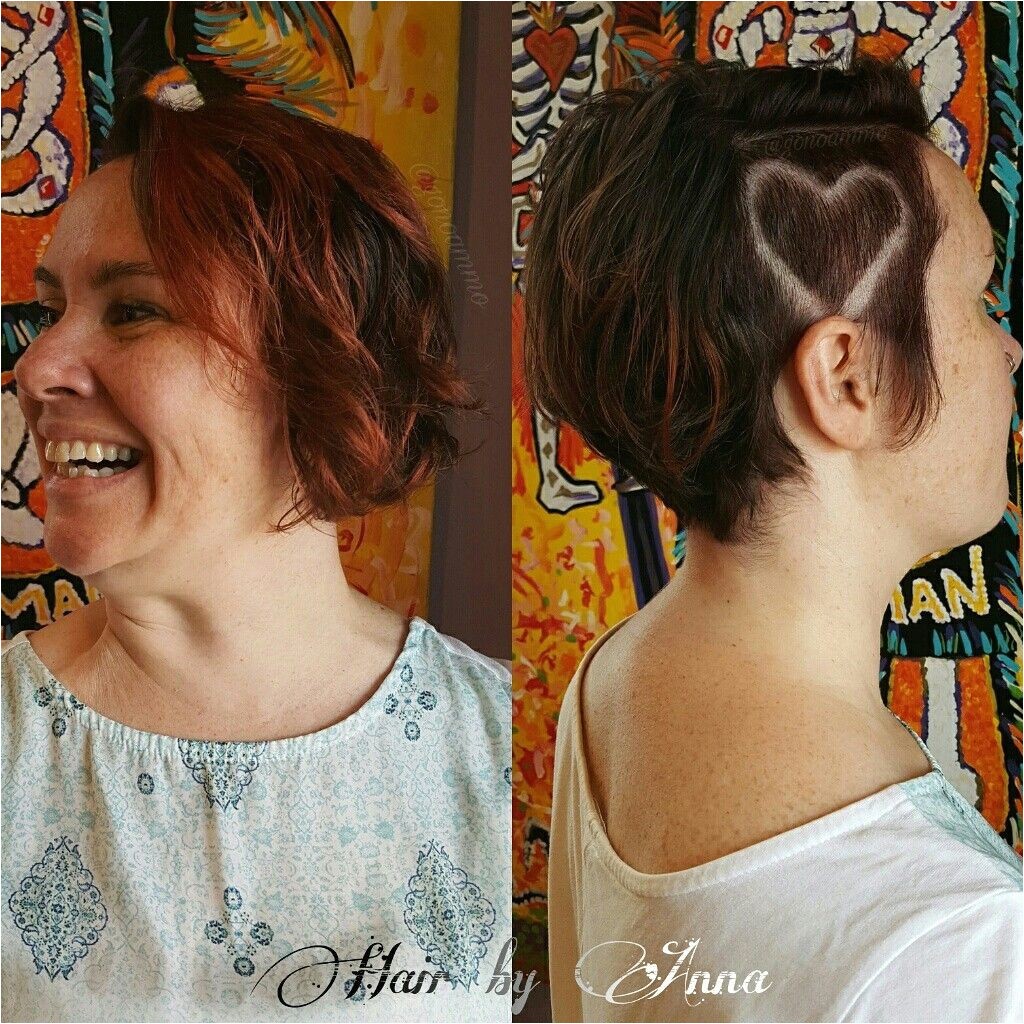 Edgy short pixie bob asymmetrical side shaved vibrant natural red hair edgy pixie