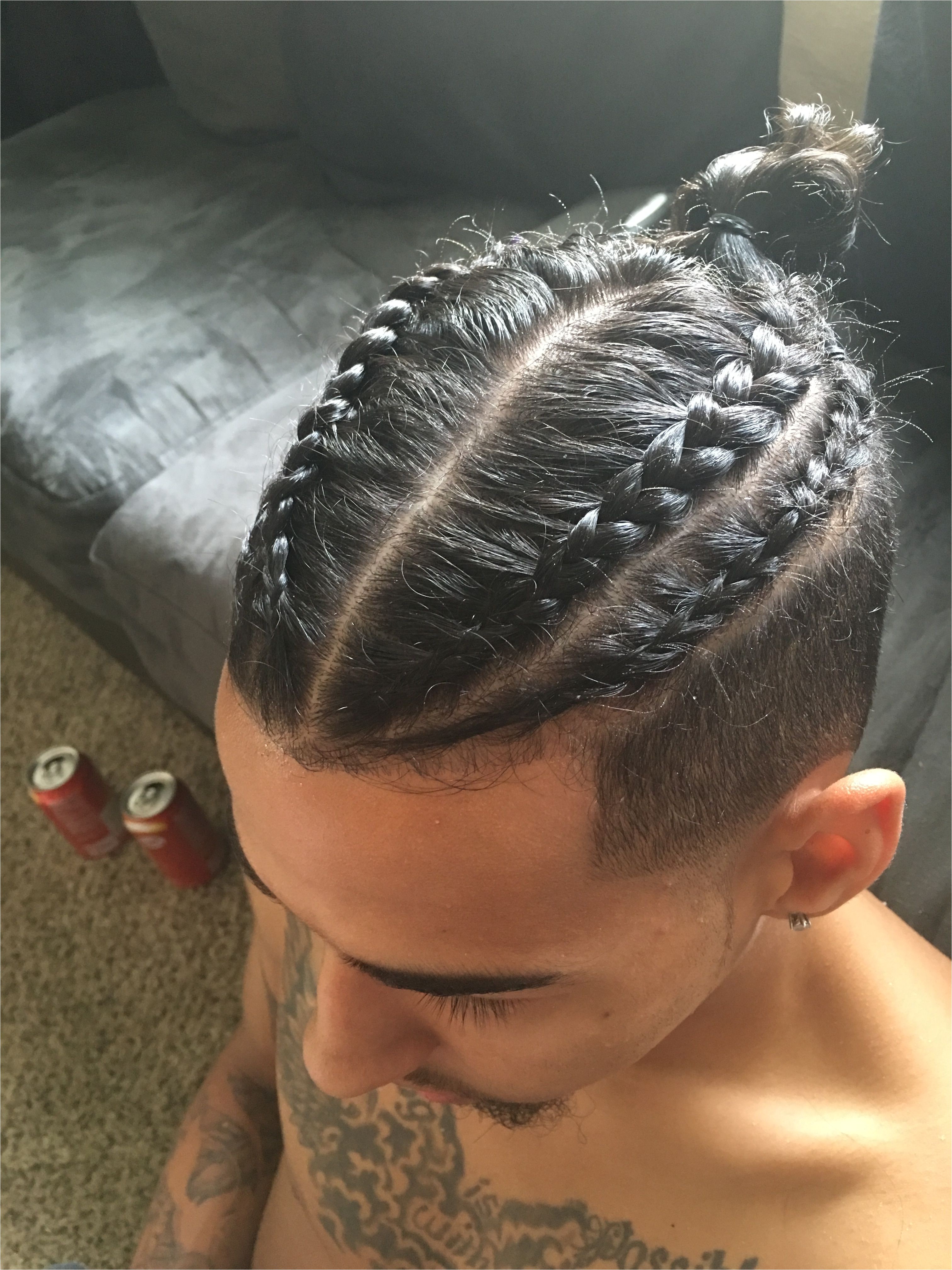 fade haircut with braided bun