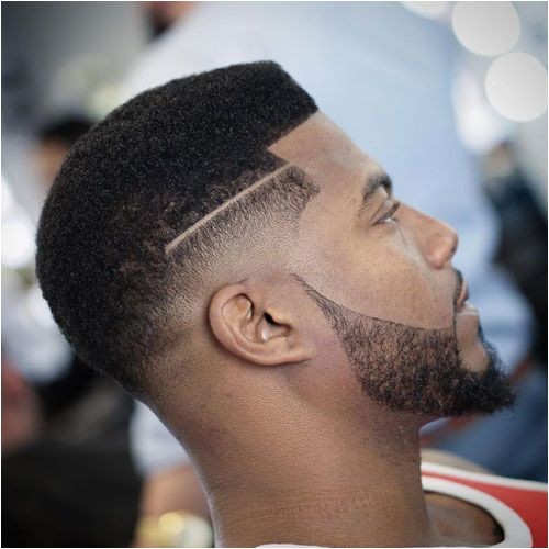 black mens haircuts low taper fade with beard