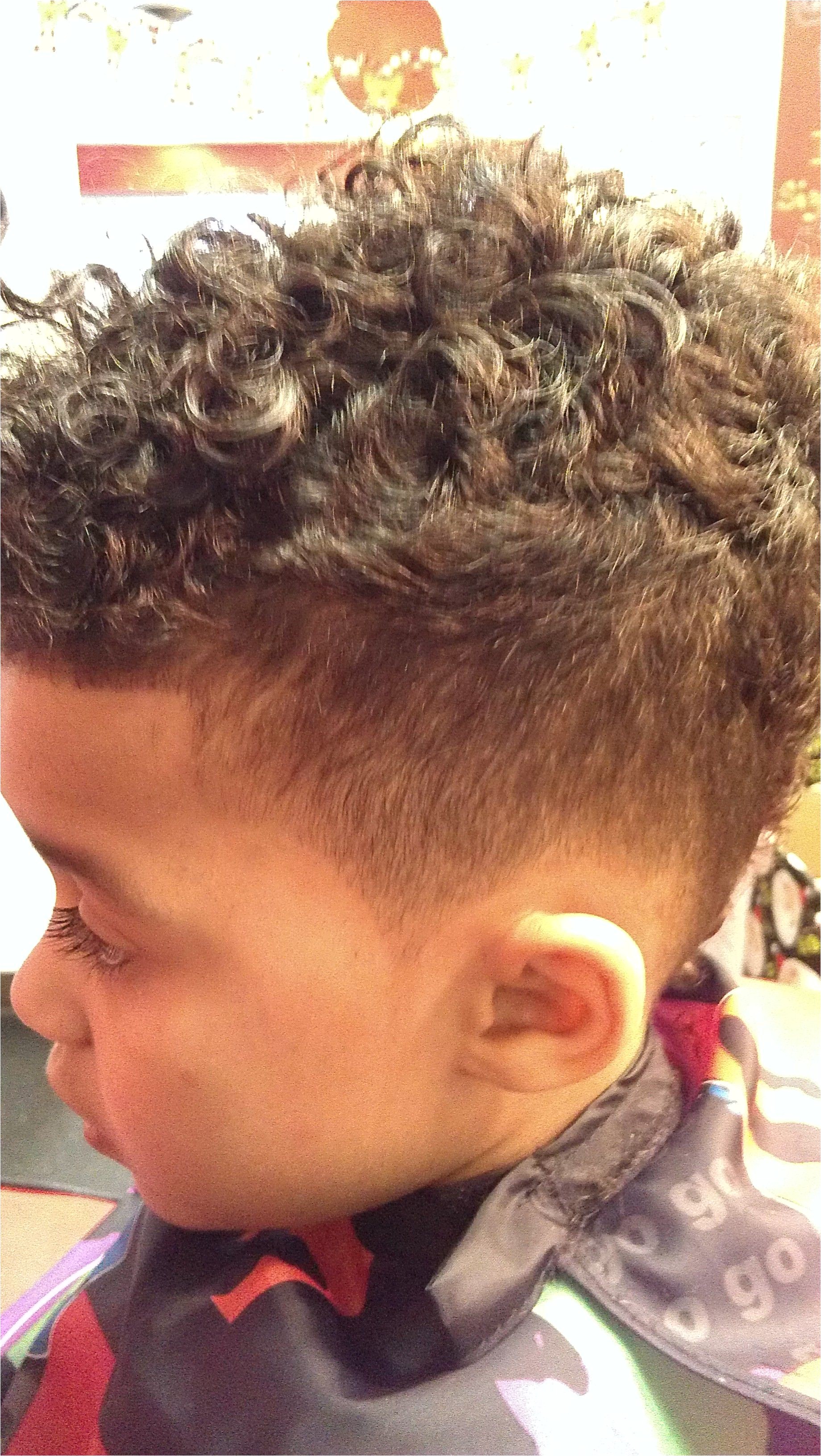 Curly MoHawk I want this on my sons curly hair