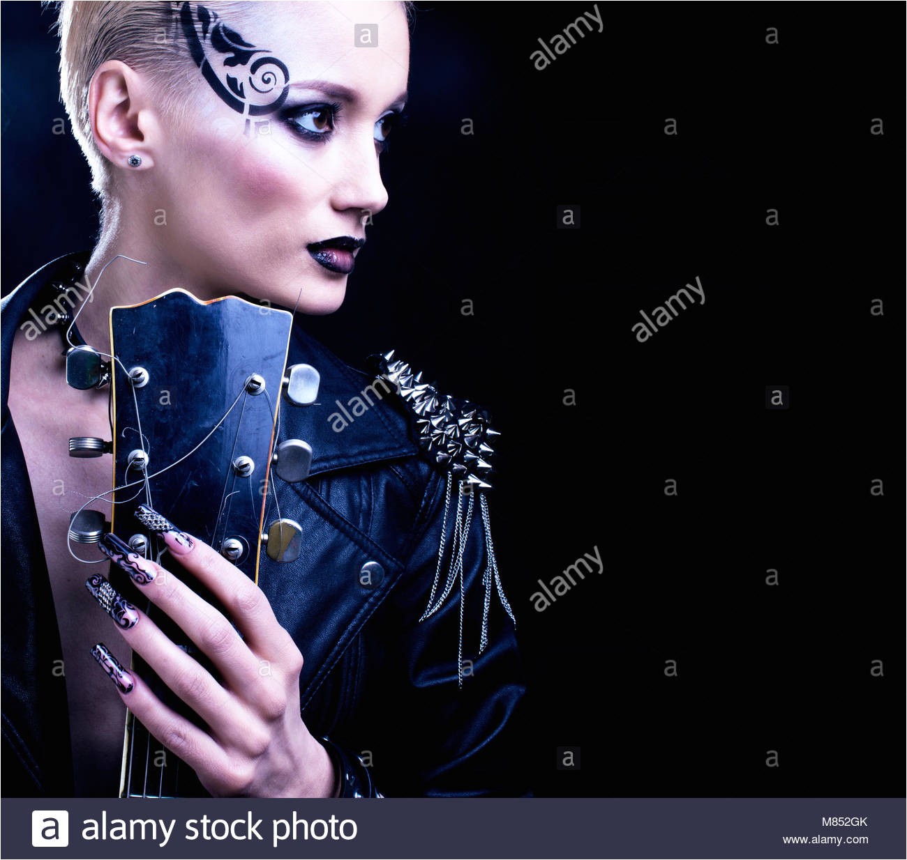 Fashion Rocker Style Model Girl Portrait Hairstyle Punk Woman Makeup Hairdo and black Nails Smoky Eyes