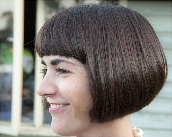 rounded bob hairstyle goes well thick front fringe