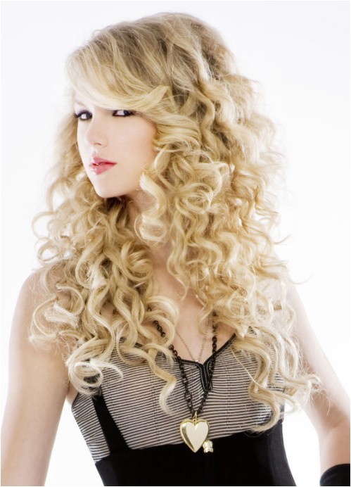 long wavy curly hairstyle with bangs