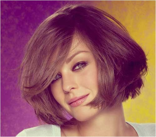easy medium length tapered bob with side part and face framing