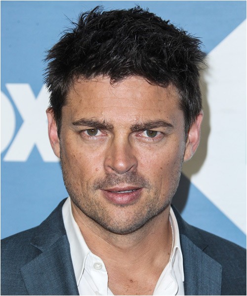 Karl Urban spiked up casual hairstyle