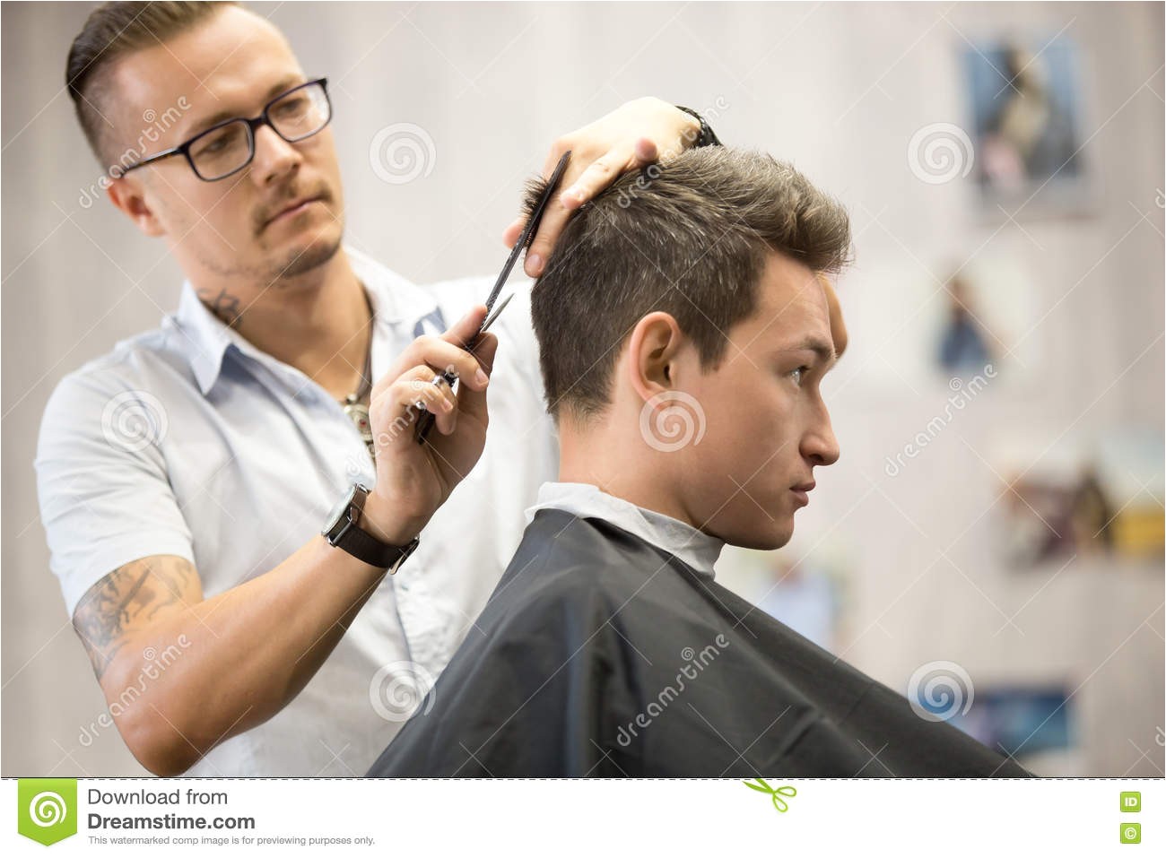 stock photo profile view portrait attractive young man ting haircut interior shot working process modern barbershop side men trendy image
