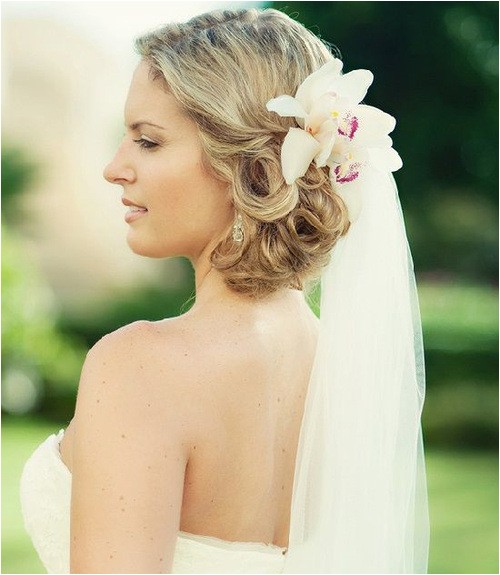 wedding hairstyles with flowers and veil