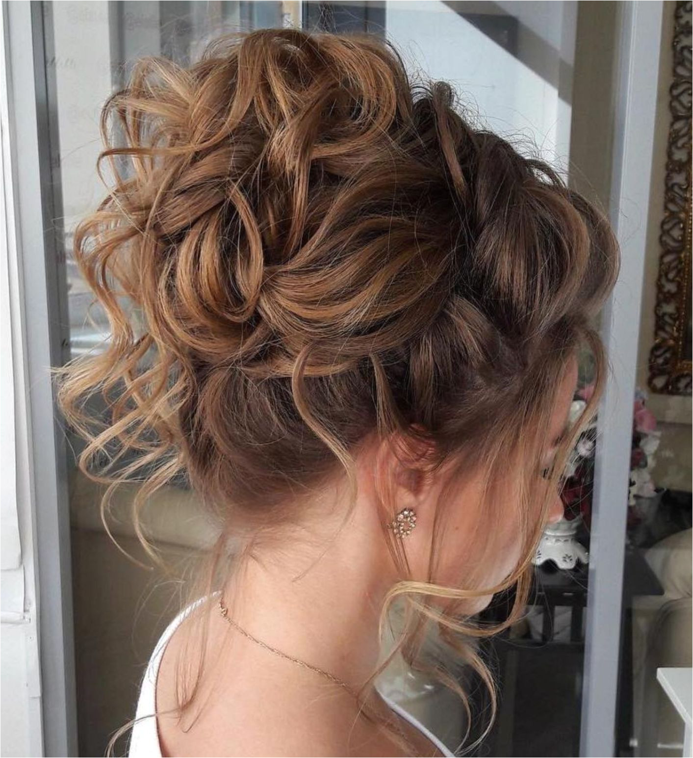 Messy Curly Bun For Thin Hair