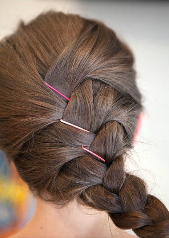 Colorful Bobby Pins Create Contrast for Dark Haired French Braids