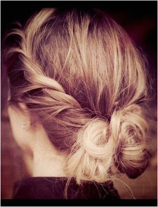 Give the messy bun a little makeover by twisting the sides and folding into the bun This hairstyle has be e a new quick after shower routine for me