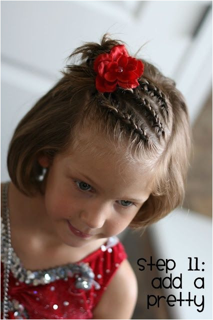 Three dutch braids into a messy bun Cute little girl s hairstyle for short or long hair Good style when growing out bangs