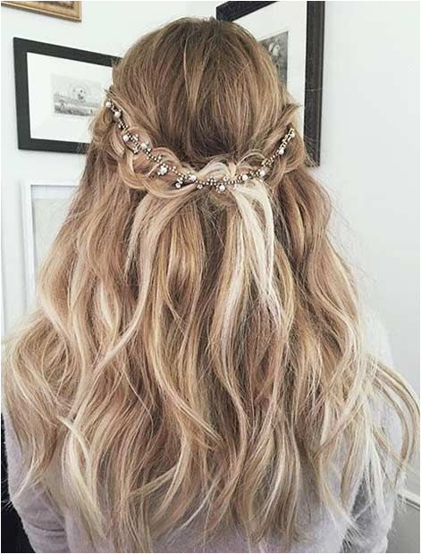Romantic Half Updo with a Hairpiece Prom Hairstyles For Long Hair Curly Prom Hair