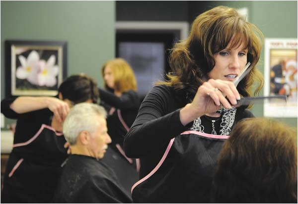 Jennifer Miller cut the hair of Chrissy Nelson on Wednesday at Govin s Barber Salon on Hastings