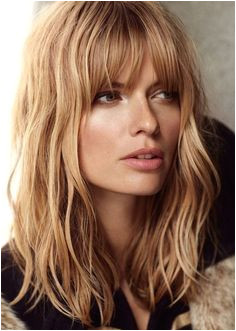 Check out this Long Bob Hairstyles for Women with Oval Face for Coarse Wavy Sunflower Blonde Hair Color with Bangs The post Long Bob Hairstyles for Women