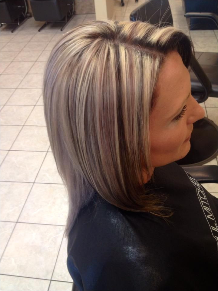 chunky 3 tone highlight and lowlight platinum blonde hair with caramel and black lowlights