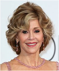 Jane Fonda Short Straight Formal Hairstyle with Side Swept Bangs Light Caramel Brunette Hair Color with Light Blonde Highlights