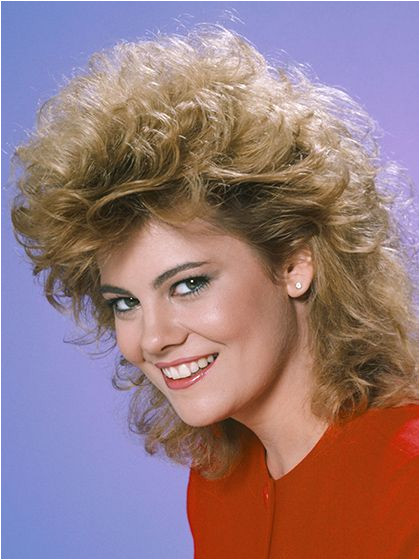 13 Hairstyles You Totally Wore in the 80s Lisa Whelchel s permed fe mullet