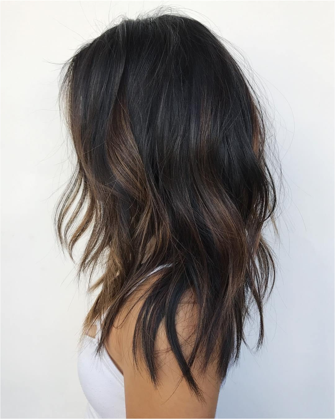 Black Hair With Subtle Brown Highlights