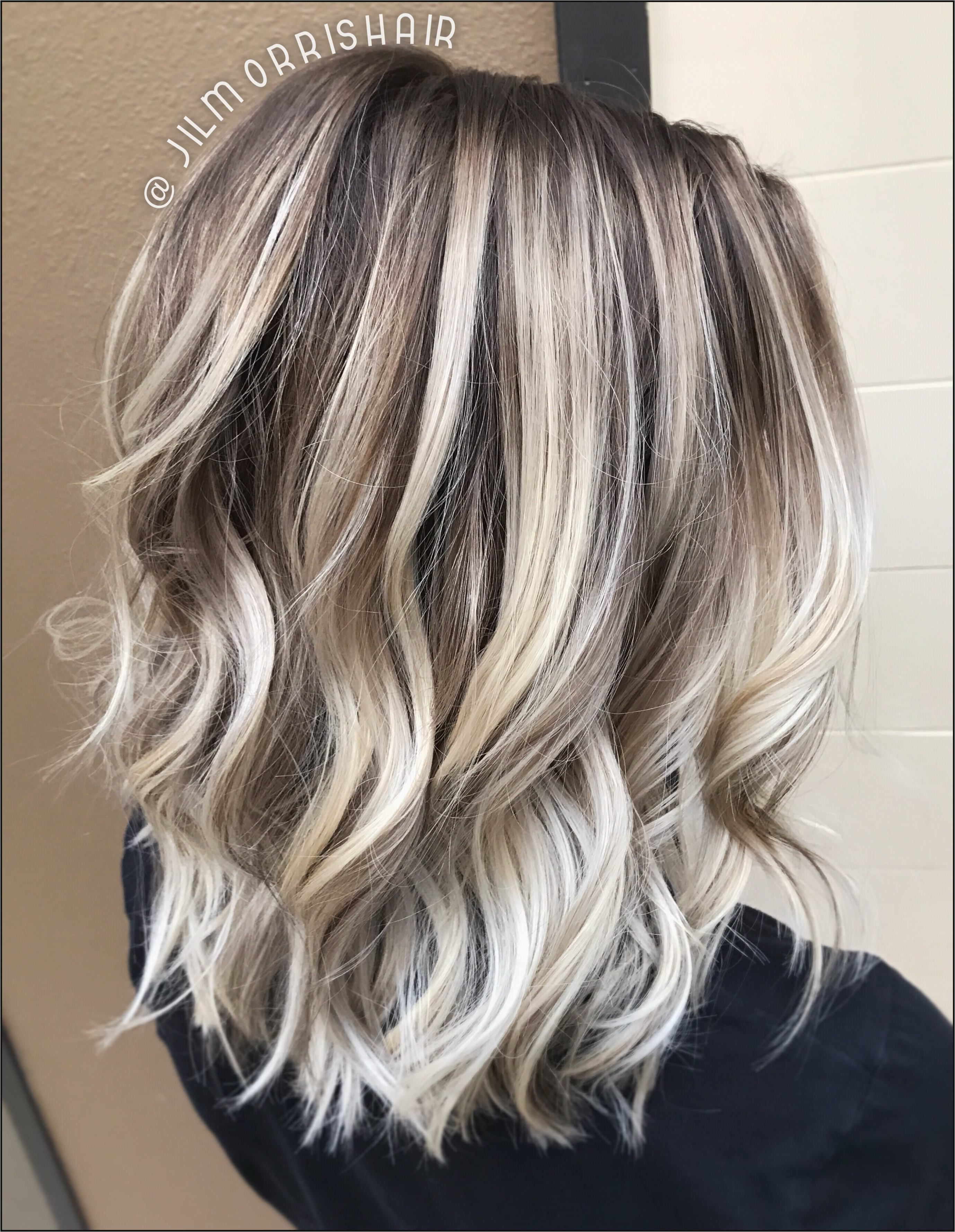 Cool icy ashy blonde balayage highlights shadow root waves and