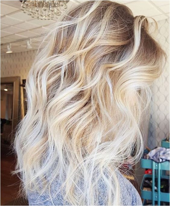 Dark Blonde Roots with Platinum Ends More