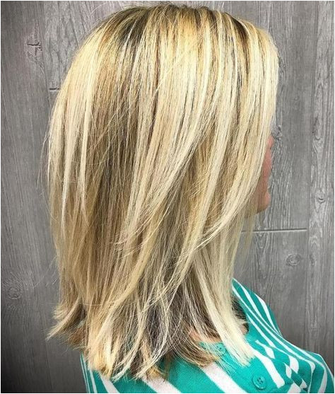 Medium Blonde Hairstyle with V cut Layers