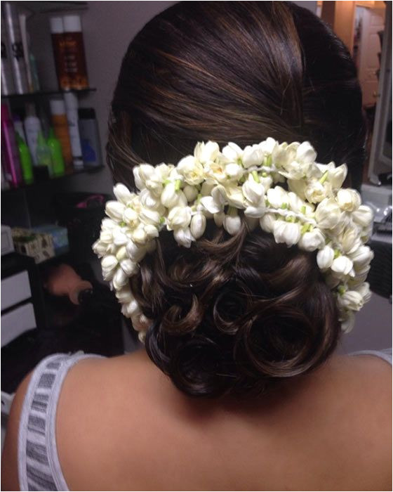 Simple and elegant hairdo with a fresh look infused wedding inspiration wedding ideas wedding halls in Mumbai wedfine