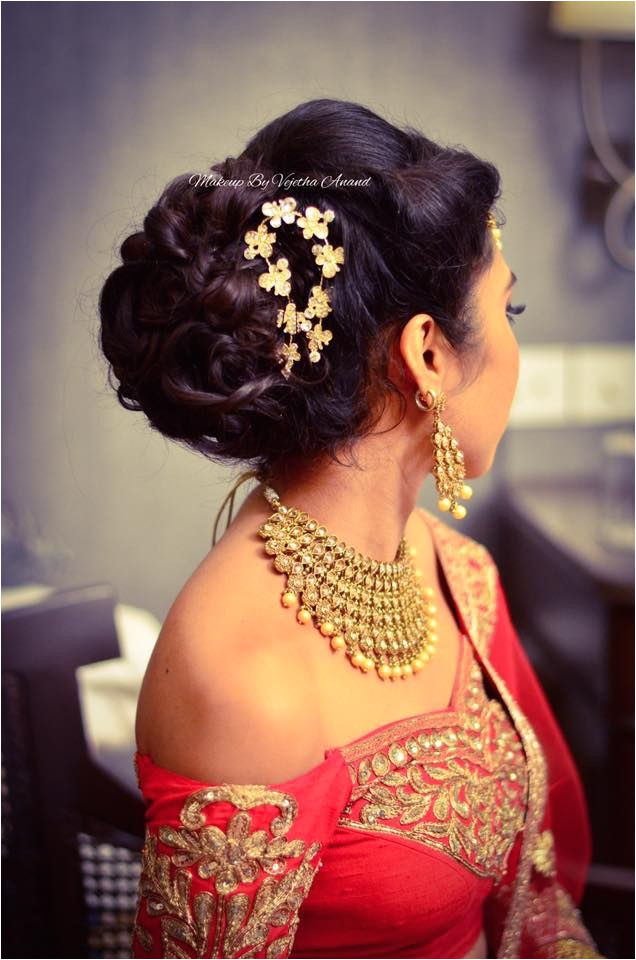 Indian bride s reception hairstyle by Vejetha for Swank Studio Bridal updo Bridal lehenga
