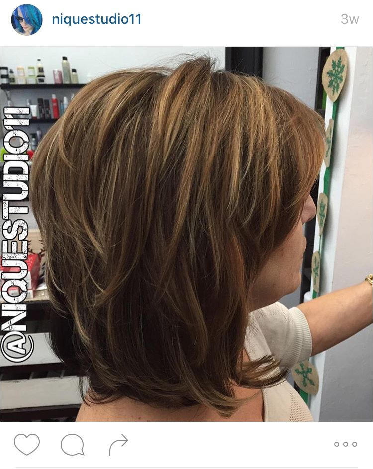 Short layered medium length haircut Lots of layers in this hair long bob lob Medium golden brown base color with fine highlights throughout