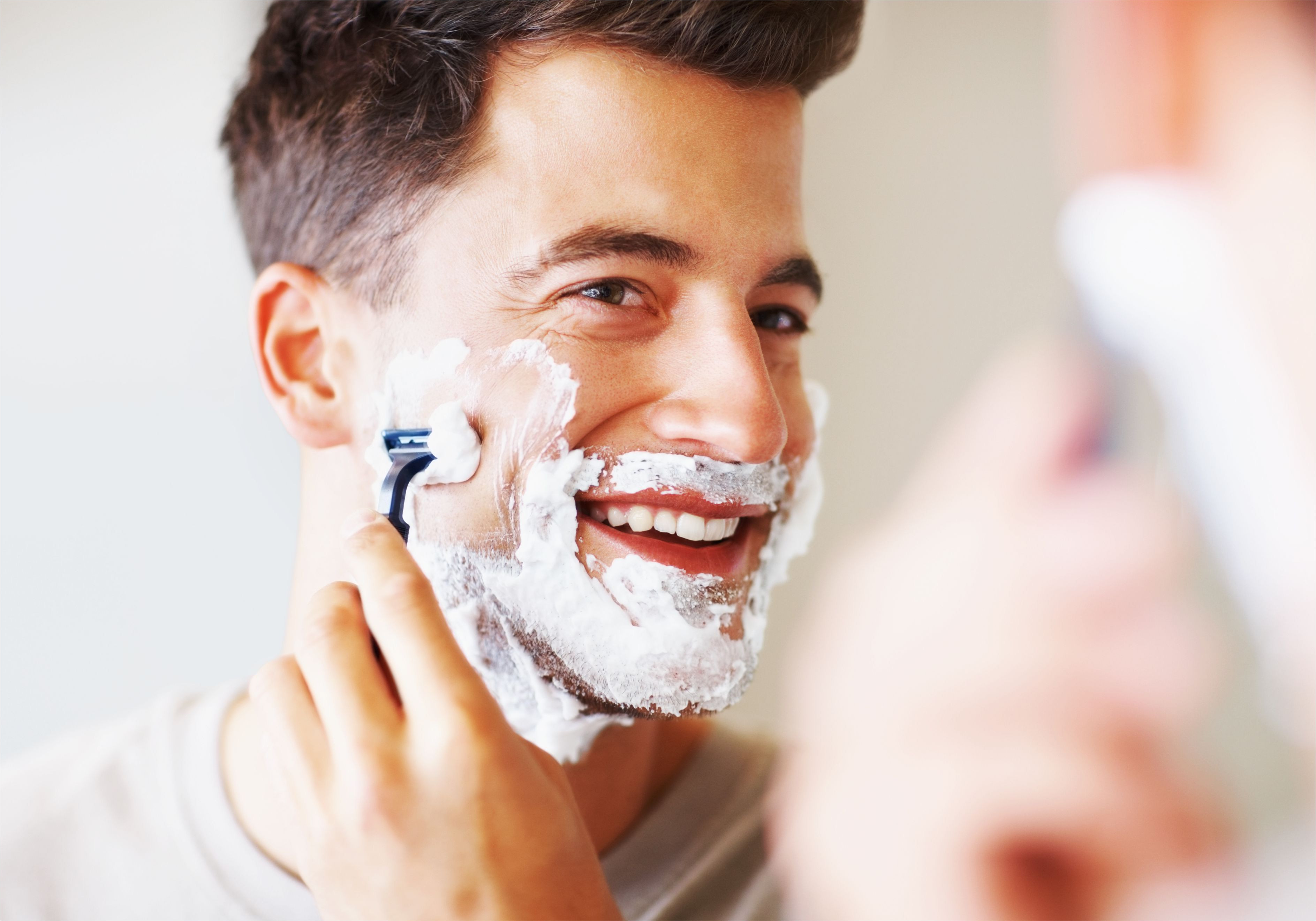 man shaving his face 56a610d03df78cf7728b2cc0