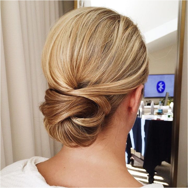 Get inspired by this fabulous simple low bun wedding hairstyle Beautiful wedding hairstyle Get inspired by fabulous wedding hairstyles wedding low updos