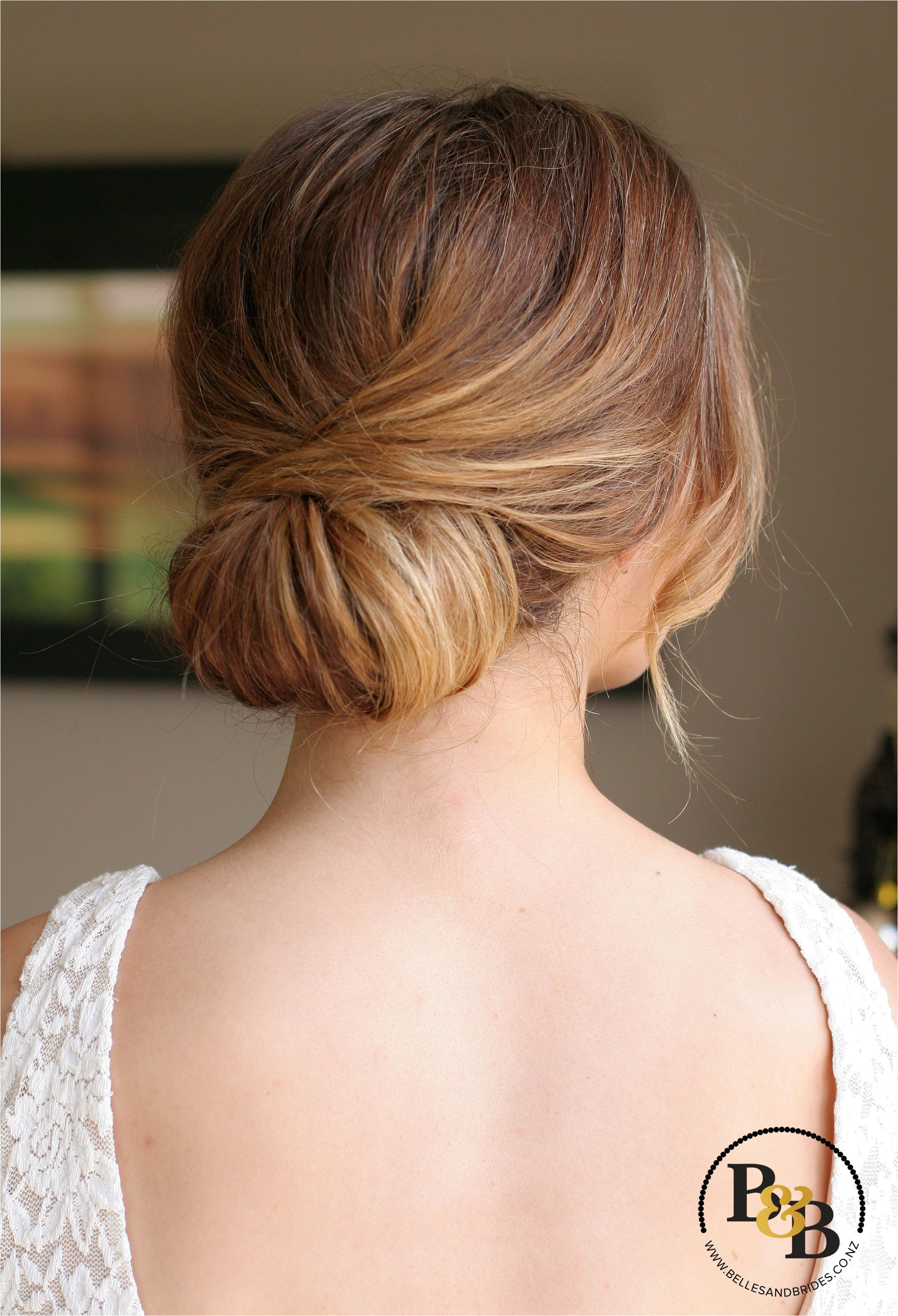 wedding hair low chignon casual bridal chignon soft romantic wedding hair