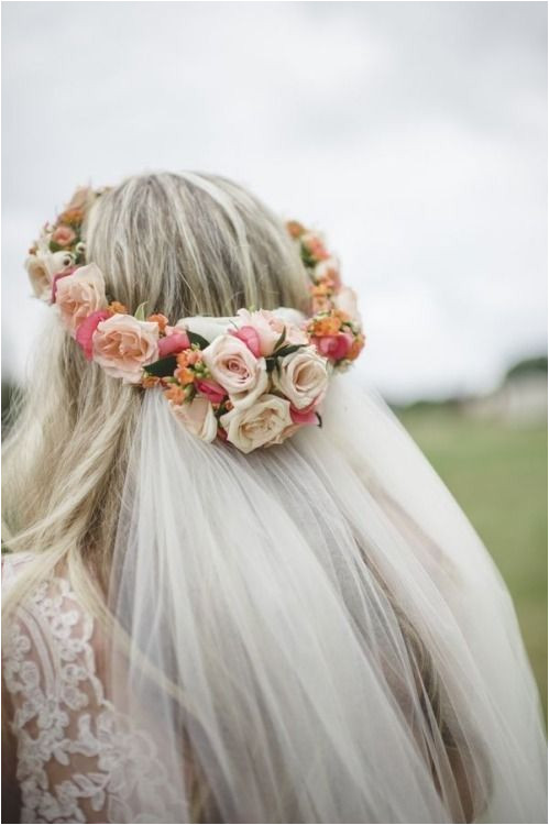 Beautiful flower crown Love how the veil is attached to it Gorgeous wedding hairstyle