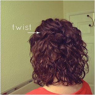 Twist and pin back the front sections of a curly bob