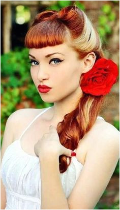 Bangs Rolls I love her hair color s and the make up too Mandy u could so wear the pin up girl look