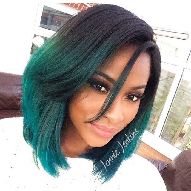 Gorgeous black girl with medium length hair cut into a bobbed styled and dyed in a black to green ombre More Hair Styles Like This