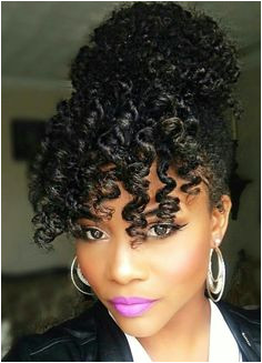 e of the cutest naturalhair hairstyles with a bun and bangs Natural Bun Hairstyles