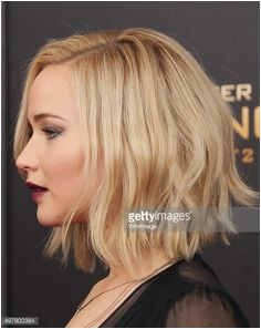 Actress Jennifer Lawrence hair detail attends the The Hunger Games Mockingjay Part 2 New York premiere at AMC Loews Lincoln Square 13 theater on