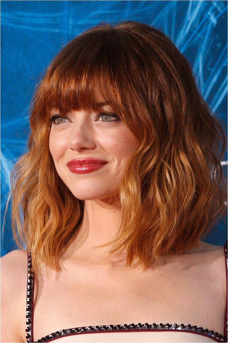Whether with side swept fringe straightened locks or tousled waves like Emma Stone this is a youthful and fresh take on the once mumsy bob