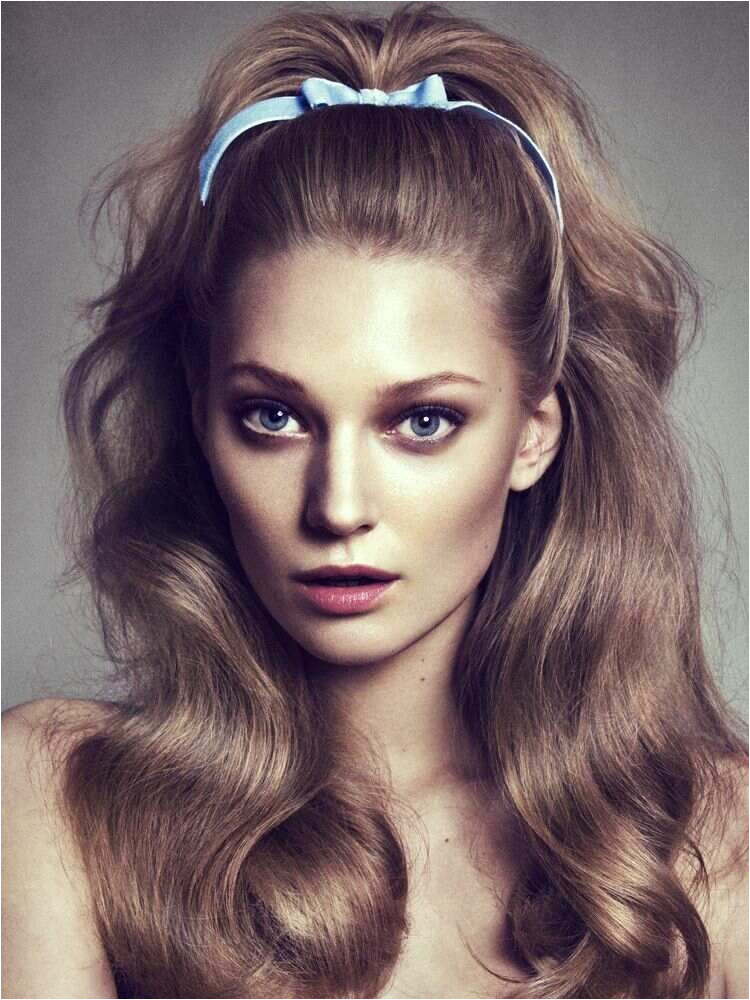 Fabulous long curled wavy light brown hair with blue bow 1950s 1960s style editorial photo shoot for Tush magazine Summer issue 2012