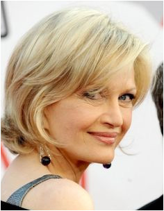 her flattering option for older woman is a chin length bob with added layers In case your hair is slightly curly it will give a cute flip at the edges