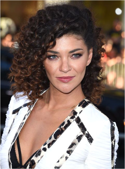 Jessica Szohr brings an edge factor to the glamorous side swept look typically worn with a smooth wave "Pin back a side using bobby pins then shake out