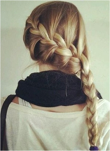 Braids are a classic go to hairstyle for summer but switch things up with a French braid styled to the side