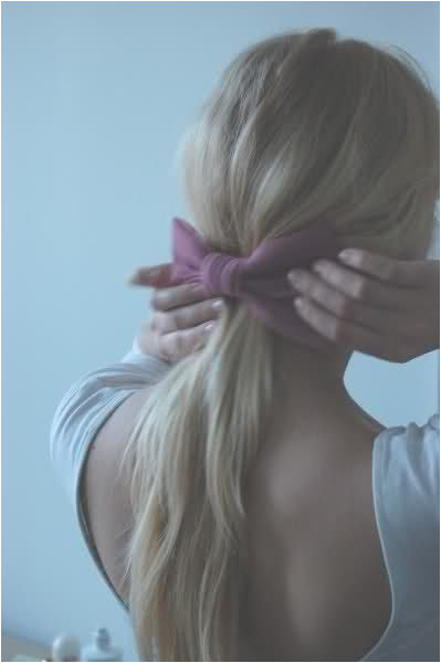 simple pony tail with pink bow